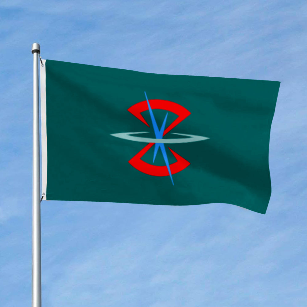 Green Zaft flag from Gundam Seed with red, blue, and gray emblem on a metal pole against a clear sky.