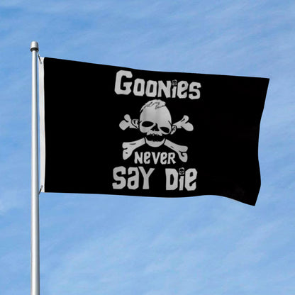 Black 3x5ft flag with white skull and crossbones and "Goonies Never Say Die" text flying on pole.